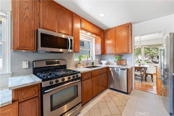 Dining room, Interior, Kitchen, Recessed Lighting, Stainless Steel Appliances, Wood Texture Flooring