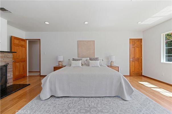 Bedroom, Fireplace, Interior, Recessed Lighting, Wood Texture Flooring