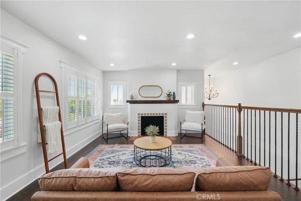 Chandelier, Fireplace, Interior, Living room, Recessed Lighting, Wood Texture Flooring