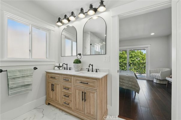 Bathroom, Dual Sink Vanities, Interior, Marble, Recessed Lighting, Wood Texture Flooring