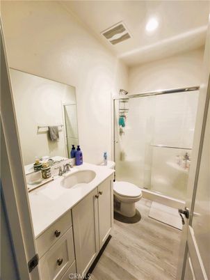Bathroom, Glass Shower, Interior, Recessed Lighting, Wood Texture Flooring