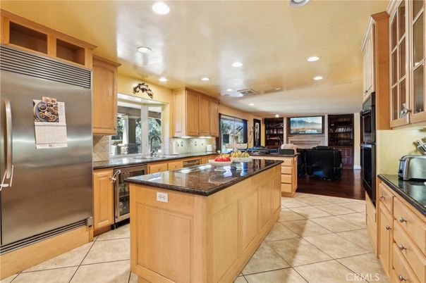 Fireplace, Interior, Kitchen, Living room, Recessed Lighting, Stainless Steel Appliances, Wood Texture Flooring