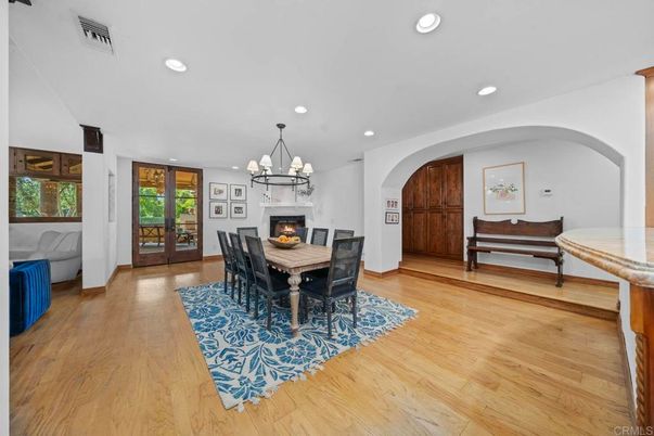 Chandelier, Dining room, Fireplace, Interior, Recessed Lighting, Wood Texture Flooring