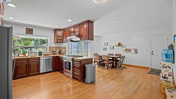 Dining room, Interior, Kitchen, Recessed Lighting, Stainless Steel Appliances, Wood Texture Flooring
