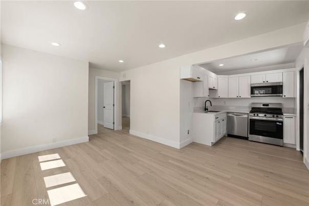 Interior, Kitchen, Recessed Lighting, Stainless Steel Appliances, Wood Texture Flooring