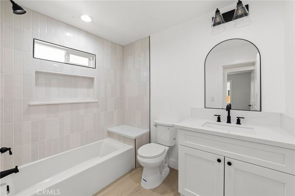Bathroom, Dual Sink Vanities, Interior, Recessed Lighting, Wood Texture Flooring