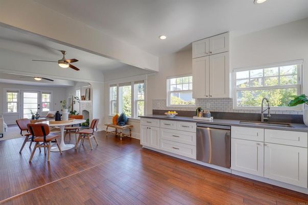 Dining room, Interior, Kitchen, Recessed Lighting, Stainless Steel Appliances, Wood Texture Flooring