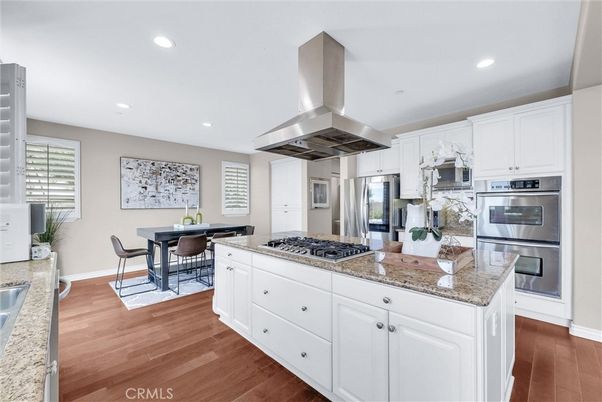 Dining room, Interior, Kitchen, Recessed Lighting, Stainless Steel Appliances, Wood Texture Flooring
