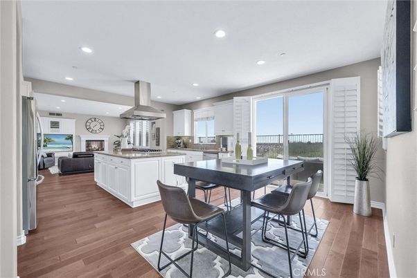 Dining room, Fireplace, Interior, Kitchen, Living room, Recessed Lighting, Wood Texture Flooring