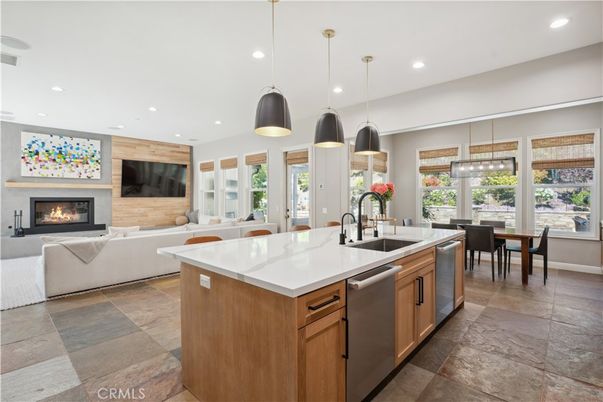 Dining room, Fireplace, Interior, Kitchen, Living room, Pendant Lights, Recessed Lighting, Stainless Steel Appliances