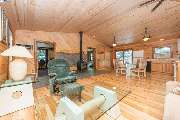 Dining room, Fireplace, Interior, Pendant Lights, Wooden Ceilings, Wood Texture Flooring, Wooden Walls