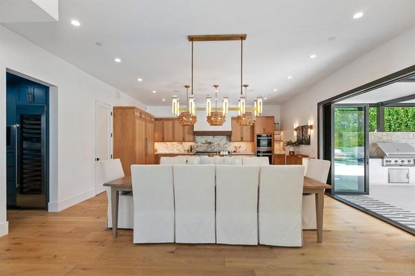 Dining room, Interior, Kitchen, Pendant Lights, Recessed Lighting, Stainless Steel Appliances, Wood Texture Flooring