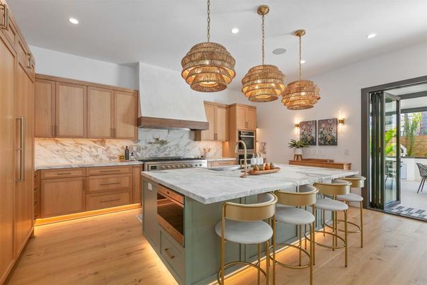 Interior, Kitchen, Marble Walls, Pendant Lights, Recessed Lighting, Stainless Steel Appliances, Wood Texture Flooring