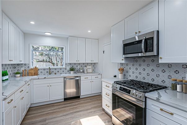 Interior, Kitchen, Recessed Lighting, Stainless Steel Appliances, Wood Texture Flooring
