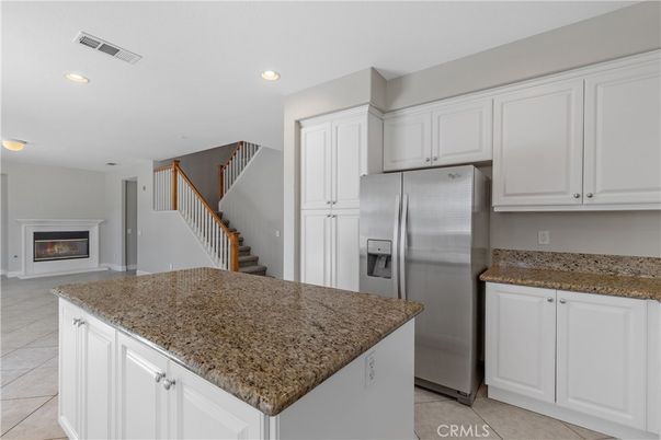 Fireplace, Interior, Kitchen, Recessed Lighting, Stainless Steel Appliances