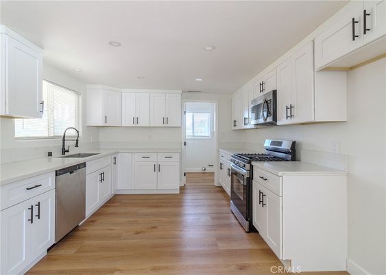 Interior, Kitchen, Recessed Lighting, Stainless Steel Appliances, Wood Texture Flooring