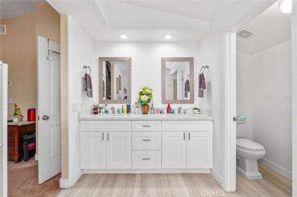 Bathroom, Dual Sink Vanities, Interior, Recessed Lighting, Wood Texture Flooring