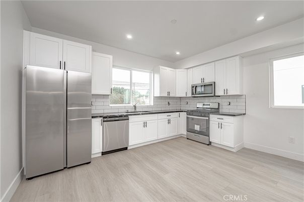 Interior, Kitchen, Recessed Lighting, Stainless Steel Appliances, Wood Texture Flooring