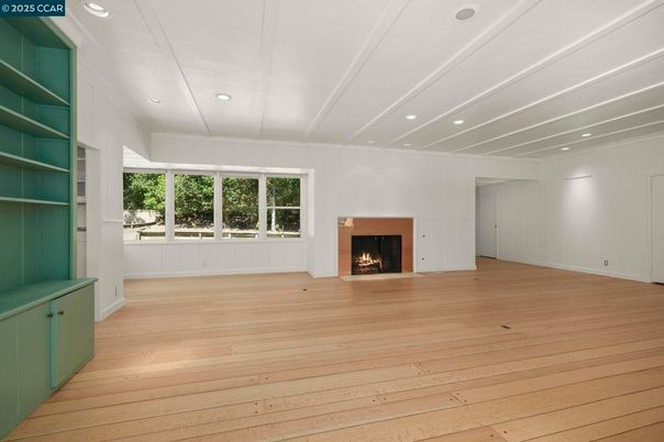 Empty room, Fireplace, Interior, Recessed Lighting, Wood Texture Flooring