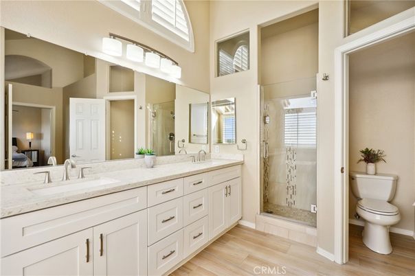 Bathroom, Dual Sink Vanities, Glass Shower, Interior, Wood Texture Flooring