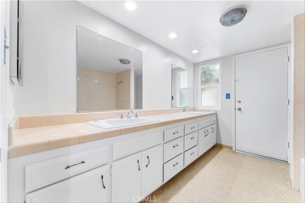 Bathroom, Dual Sink Vanities, Glass Shower, Interior, Recessed Lighting, Tile Countertops