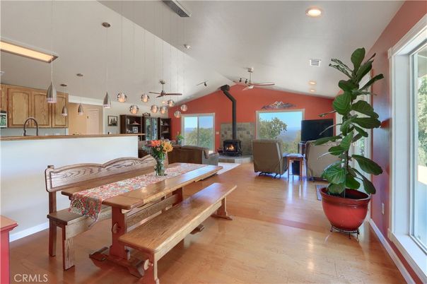 Dining room, Fireplace, Interior, Living room, Pendant Lights, Recessed Lighting, Wood Texture Flooring