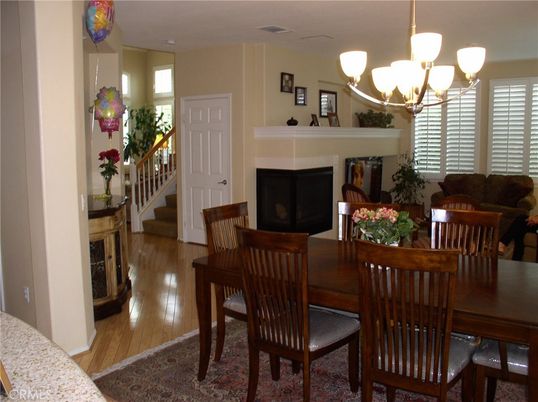 Chandelier, Dining room, Fireplace, Interior, Wood Texture Flooring