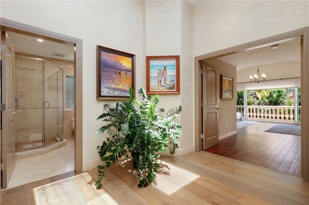 Bathroom, Chandelier, Glass Shower, Interior, Recessed Lighting, Wood Texture Flooring