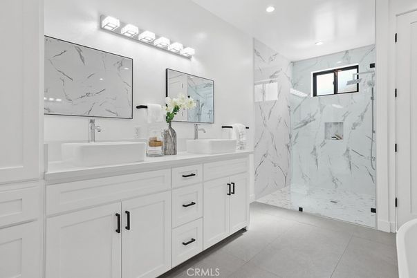 Bathroom, Dual Sink Vanities, Glass Shower, Interior, Marble Walls, Recessed Lighting