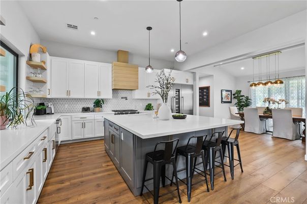 Dining room, Interior, Kitchen, Pendant Lights, Recessed Lighting, Stainless Steel Appliances, Wood Texture Flooring