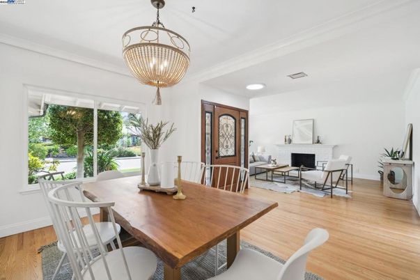 Chandelier, Dining room, Fireplace, Interior, Living room, Recessed Lighting, Wood Texture Flooring