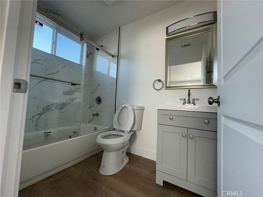 Bathroom, Glass Shower, Interior, Marble Walls, Wood Texture Flooring