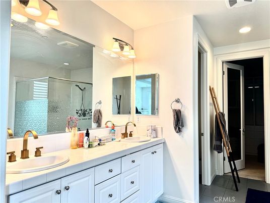 Bathroom, Dual Sink Vanities, Glass Shower, Interior, Recessed Lighting, Tile Countertops