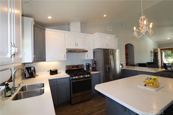 Chandelier, Interior, Kitchen, Recessed Lighting, Stainless Steel Appliances, Wood Texture Flooring