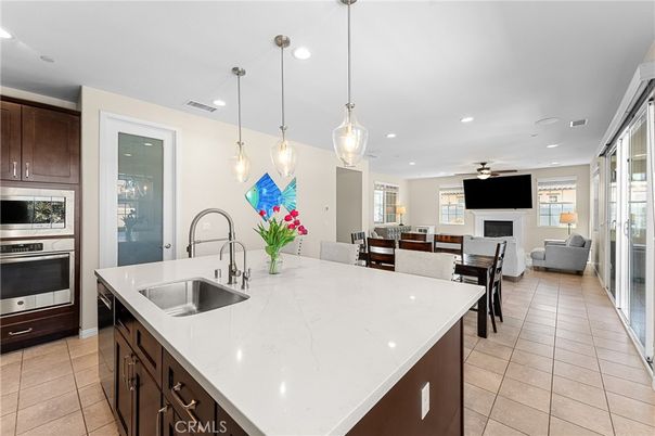 Dining room, Fireplace, Interior, Kitchen, Living room, Pendant Lights, Recessed Lighting, Stainless Steel Appliances