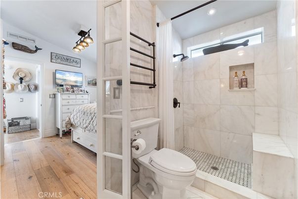 Bathroom, Bedroom, Glass Shower, Interior, Marble Walls, Recessed Lighting, Wood Texture Flooring