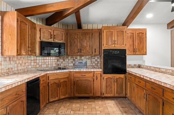 Interior, Kitchen, Recessed Lighting, Tile Countertops, Wooden Beams