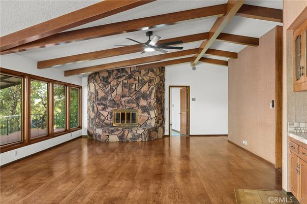 Empty room, Fireplace, Interior, Stone Walls, Wooden Beams, Wood Texture Flooring