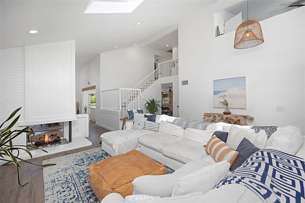 Dining room, Fireplace, Interior, Living room, Pendant Lights, Recessed Lighting, Wood Texture Flooring