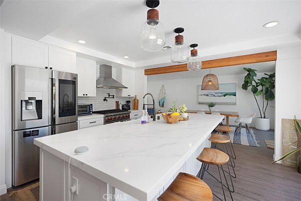 Fireplace, Interior, Kitchen, Recessed Lighting, Stainless Steel Appliances, Wooden Beams, Wood Texture Flooring