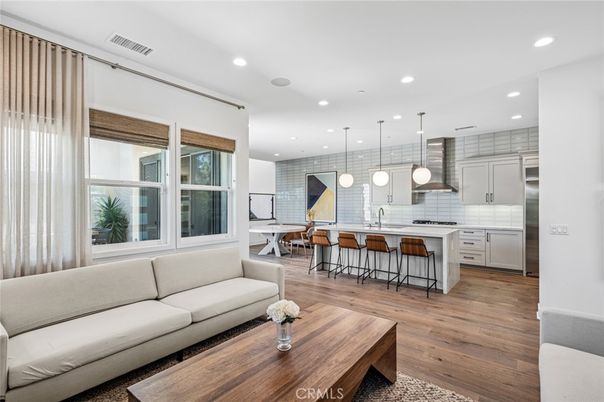 Dining room, Interior, Kitchen, Living room, Pendant Lights, Recessed Lighting, Stainless Steel Appliances, Wood Texture Flooring