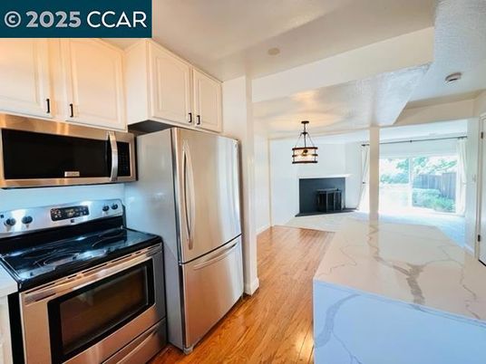 Interior, Kitchen, Pendant Lights, Stainless Steel Appliances, Wood Texture Flooring