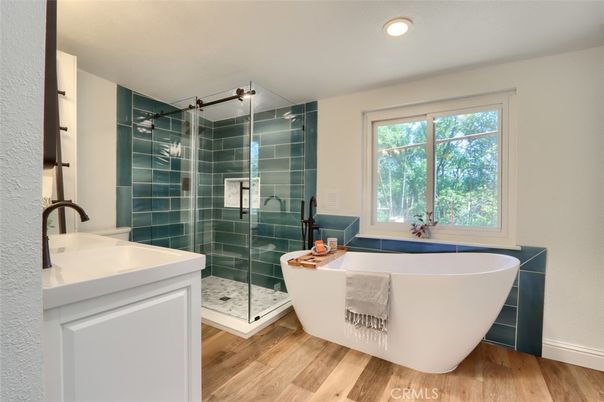 Bathroom, Free Standing Baths, Glass Shower, Interior, Recessed Lighting, Wood Texture Flooring