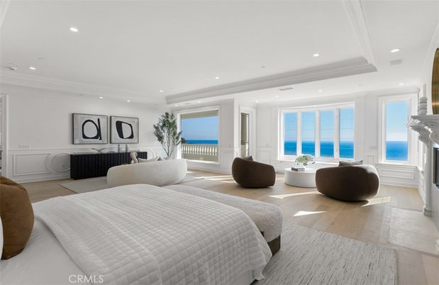 Bedroom, Fireplace, Interior, Recessed Lighting, Water, Wood Texture Flooring