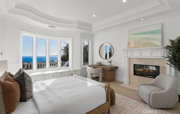 Bedroom, Fireplace, Interior, Recessed Lighting, Water, Wood Texture Flooring