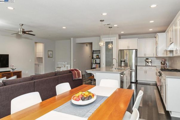 Dining room, Interior, Kitchen, Pendant Lights, Recessed Lighting, Stainless Steel Appliances, Wood Texture Flooring