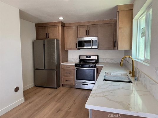 Interior, Kitchen, Recessed Lighting, Stainless Steel Appliances, Wood Texture Flooring