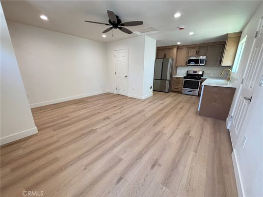 Interior, Kitchen, Recessed Lighting, Stainless Steel Appliances, Wood Texture Flooring