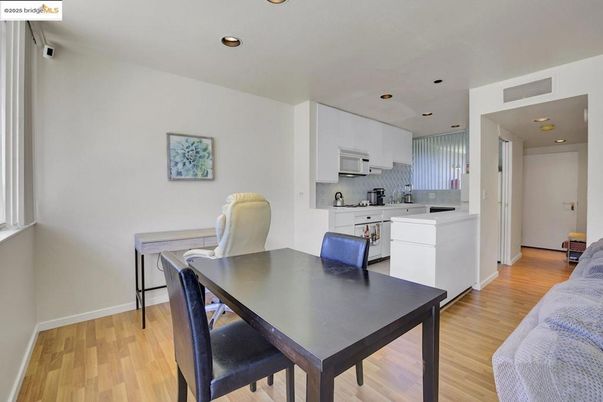 Dining room, Interior, Kitchen, Recessed Lighting, Stainless Steel Appliances, Wood Texture Flooring
