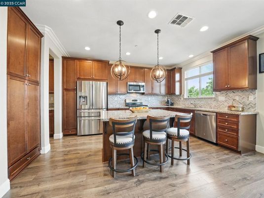 Interior, Kitchen, Pendant Lights, Recessed Lighting, Stainless Steel Appliances, Wood Texture Flooring